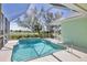 Inviting screened pool with a view of lake and golf course at 109 Westwind Dr, Placida, FL 33946