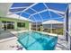 Enjoy this screened-in pool, perfect for relaxation and outdoor fun at 109 Westwind Dr, Placida, FL 33946