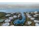 Panoramic aerial view of waterfront homes, docks, and landscaping at 11000 Placida Rd # 301, Placida, FL 33946