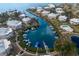 Aerial view of waterfront homes, docks, and lush landscaping at 11000 Placida Rd # 301, Placida, FL 33946