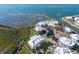 Stunning aerial view of waterfront community with boat docks and pool at 11000 Placida Rd # 301, Placida, FL 33946