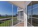 Screened balcony offers stunning water views and ample natural light at 11000 Placida Rd # 301, Placida, FL 33946