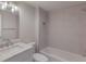 Bathroom featuring a marble vanity, a shower with tiles, and a bathtub at 11000 Placida Rd # 301, Placida, FL 33946