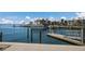 Scenic waterfront view of the canal showing boat docks and Ferry Landing condominium buildings at 11000 Placida Rd # 301, Placida, FL 33946