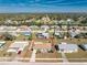 Lovely home nestled in a quiet neighborhood, featuring a manicured lawn and easy access to nearby amenities at 13532 Romford Ave, Port Charlotte, FL 33981