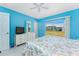 Comfortable bedroom featuring a sliding glass door with views of the outdoors at 13532 Romford Ave, Port Charlotte, FL 33981