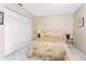 Bedroom featuring neutral tones, and a large closet at 13532 Romford Ave, Port Charlotte, FL 33981