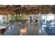 Clubhouse with pool table, ping pong, exercise equipment, and stone-accented walls at 13532 Romford Ave, Port Charlotte, FL 33981