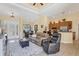 Open concept living room and kitchen space, with tile flooring, and a smooth transition for comfortable living at 252 Australian Dr, Rotonda West, FL 33947