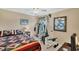 Bedroom with ceiling fan, window and exercise machine at 39 Tournament Rd, Rotonda West, FL 33947