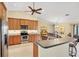 Kitchen with stainless steel appliances and a breakfast bar at 39 Tournament Rd, Rotonda West, FL 33947