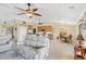 Open concept living area with view of kitchen and bar seating at 39 Tournament Rd, Rotonda West, FL 33947