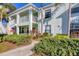 Inviting two-story condo featuring lush landscaping and a private balcony at 5725 Greenwood Ave # 8101, North Port, FL 34287