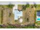 An aerial view of a single-story home featuring a light roof and surrounding yard at 10307 Grail Ave, Englewood, FL 34224