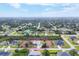 Stunning aerial view of the property showcasing its location within a peaceful residential neighborhood at 10307 Grail Ave, Englewood, FL 34224