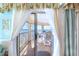 Patio with outdoor seating, offering stunning water views and a peaceful retreat at 11000 Placida Rd # 101, Placida, FL 33946