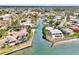 A picturesque neighborhood scene featuring waterfront properties along a scenic canal and the community at 232 Bahia Vista Dr, Englewood, FL 34223