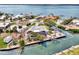 Aerial view highlighting the property lines of a waterfront home with screened lanai, and private dock at 232 Bahia Vista Dr, Englewood, FL 34223
