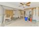 Unfinished basement featuring exposed studs, flooring in need of replacement and the potential to make it your own at 232 Bahia Vista Dr, Englewood, FL 34223