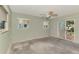 Bedroom with natural light and sliding door access to the backyard at 232 Bahia Vista Dr, Englewood, FL 34223