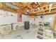 Spacious garage with open ceiling, perfect for storage, or a workshop at 232 Bahia Vista Dr, Englewood, FL 34223