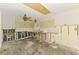 Spacious unfinished kitchen featuring exposed wooden beams and natural light at 232 Bahia Vista Dr, Englewood, FL 34223