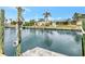 Scenic waterfront view of a canal with docks and charming houses, showcasing the property's desirable location at 232 Bahia Vista Dr, Englewood, FL 34223