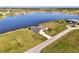 Scenic aerial view of a home situated on a waterfront property surrounded by lush landscapes at 43 Blue Hen Dr, Placida, FL 33946