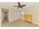 Bedroom featuring closet, window, dresser, and light-colored walls and flooring at 43 Blue Hen Dr, Placida, FL 33946