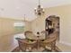 Living room with dining area features plenty of space and natural lighting at 43 Blue Hen Dr, Placida, FL 33946