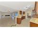 Bright living room features an open concept with eat-in kitchen and plenty of living space at 43 Blue Hen Dr, Placida, FL 33946