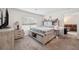 Cozy main bedroom featuring carpet and ample natural light at 5177 Rocky Coast Pl, Palmetto, FL 34221