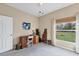 Bedroom with a desk, and bright window view at 13354 Blytheville Ave, Port Charlotte, FL 33981