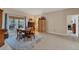 Neutral dining room offering a round wooden table at 13354 Blytheville Ave, Port Charlotte, FL 33981