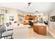 Open kitchen featuring a breakfast bar, stainless steel appliances and wood cabinetry at 13354 Blytheville Ave, Port Charlotte, FL 33981