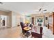 Bright and airy living room with tile flooring and lots of natural light at 13354 Blytheville Ave, Port Charlotte, FL 33981