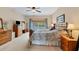 Spacious main bedroom with large window and ensuite bathroom at 13354 Blytheville Ave, Port Charlotte, FL 33981