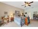 Large main bedroom with a decorative bed frame, desk, and good natural light at 13354 Blytheville Ave, Port Charlotte, FL 33981