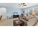 Spacious living room featuring neutral walls, tile floors and ample natural light at 15081 Aldama Cir, Port Charlotte, FL 33981