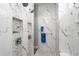 Luxurious marble shower with custom tile details, built in niche and sleek fixtures, enhancing spa-like experience at 15691 Meacham Cir, Port Charlotte, FL 33981