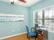 Cozy office space with a desk, chair, large window and filled with natural light at 209 Malina Ct, Nokomis, FL 34275