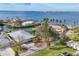 Stunning aerial view of waterfront community with lush landscaping and quick gulf access at 295 North Dr, Englewood, FL 34223
