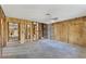 Unfinished living room displaying an open layout with exposed framing at 295 North Dr, Englewood, FL 34223