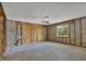 Under construction room with exposed framing, offering potential for renovation at 295 North Dr, Englewood, FL 34223