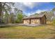 Large two-car garage and a driveway, providing ample parking space at 3892 Alwood St, North Port, FL 34291