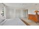 Comfortable main bedroom features bright walls, hardwood floors, and two large closets at 3892 Alwood St, North Port, FL 34291