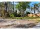 Large lot, providing ample space and natural beauty with mature trees and landscaping, perfect for outdoor enjoyment at 3892 Alwood St, North Port, FL 34291