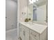 Well-lit bathroom with a contemporary vanity, ample storage, and a pristine mirror, offering a fresh, clean aesthetic at 6237 Fish Eagle Ct, Nokomis, FL 34275