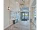 Elegant lobby featuring stylish decor, tile floors, and a bright, welcoming atmosphere at 6237 Fish Eagle Ct, Nokomis, FL 34275