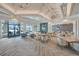 Expansive lounge with comfortable seating, tables, and poolside access, perfect for relaxation and socializing at 6237 Fish Eagle Ct, Nokomis, FL 34275